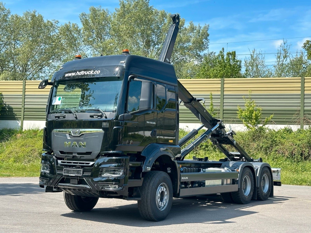MAN TGS 33.520 6X4 Euro6e Abrollkipper MULTILIFT - Camião polibenne, Camião grua: foto 2 MAN TGS 33.520 6X4 Euro6e Abrollkipper MULTILIFT - Camião polibenne, Camião grua: foto 2