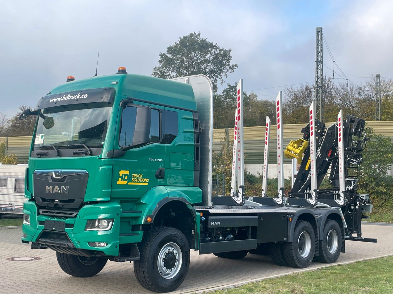 MAN TGS 33.520 6X6 Euro6e Loglift 165 Z Retarder - Camião de transporte de madeira, Camião grua: foto 1 MAN TGS 33.520 6X6 Euro6e Loglift 165 Z Retarder - Camião de transporte de madeira, Camião grua: foto 1
