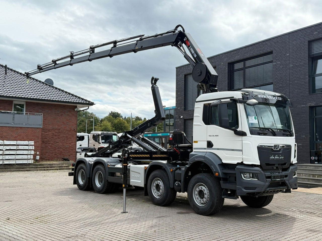 MAN TGS 35.480 8x4 Abrollkipper + Kran HIAB 228-6 - Camião polibenne, Camião grua: foto 1 MAN TGS 35.480 8x4 Abrollkipper + Kran HIAB 228-6 - Camião polibenne, Camião grua: foto 1