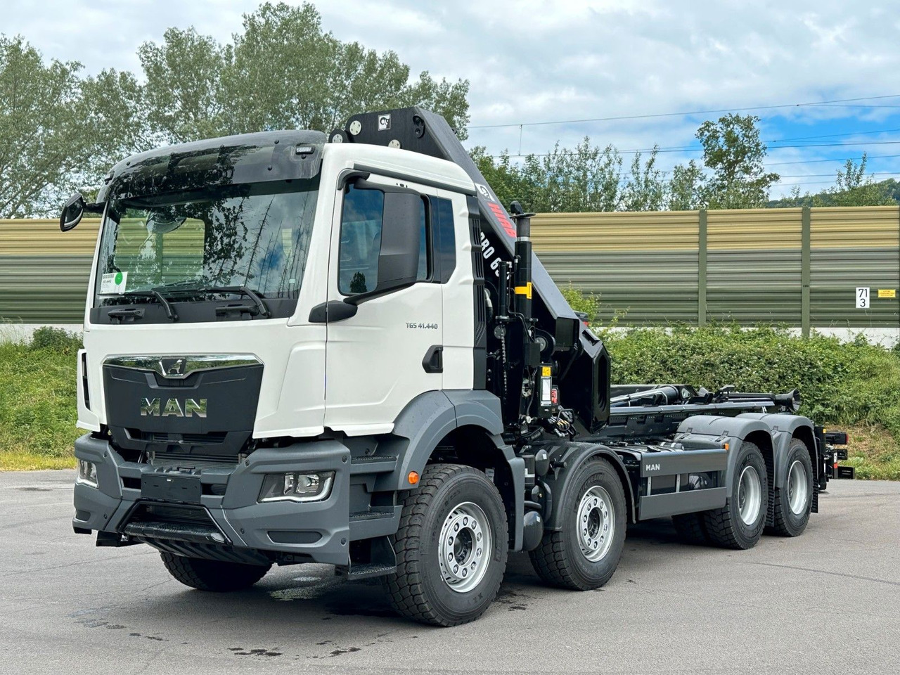 MAN TGS 35.520 8x4 Abrollkipper + Kran HIAB 658E6 - Camião polibenne, Camião grua: foto 2 MAN TGS 35.520 8x4 Abrollkipper + Kran HIAB 658E6 - Camião polibenne, Camião grua: foto 2