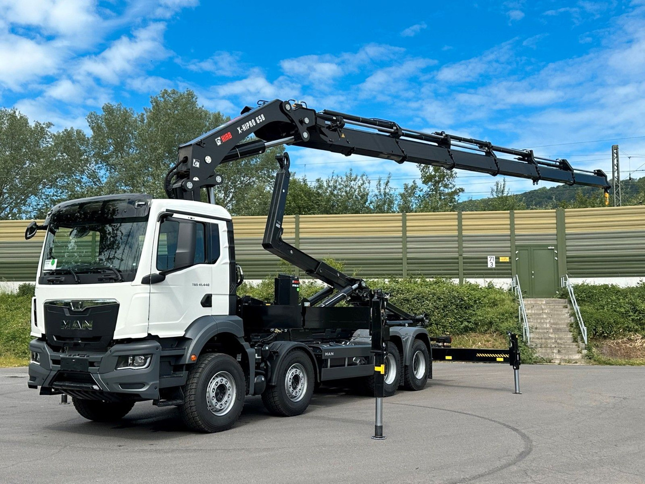 MAN TGS 35.520 8x4 Abrollkipper + Kran HIAB 658E6 - Camião polibenne, Camião grua: foto 1 MAN TGS 35.520 8x4 Abrollkipper + Kran HIAB 658E6 - Camião polibenne, Camião grua: foto 1