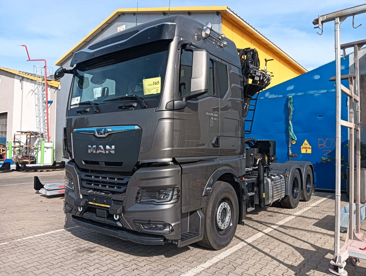 MAN TGX 26.580 6x4 LANGHOLZ EPSILON TZ 17 - Camião de transporte de madeira, Camião grua: foto 1 MAN TGX 26.580 6x4 LANGHOLZ EPSILON TZ 17 - Camião de transporte de madeira, Camião grua: foto 1