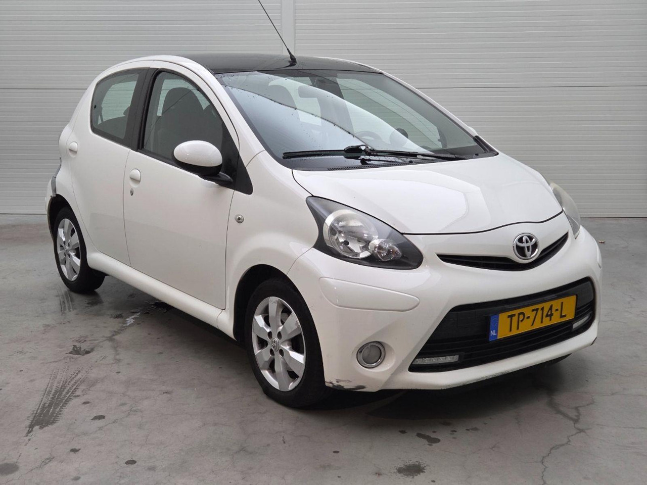 Toyota Aygo 1.0 VVT - i Now | 2014 | 131.940 km | TP714L | NAP: Geen oordeel - Hatchback: foto 2 Toyota Aygo 1.0 VVT - i Now | 2014 | 131.940 km | TP714L | NAP: Geen oordeel - Hatchback: foto 2