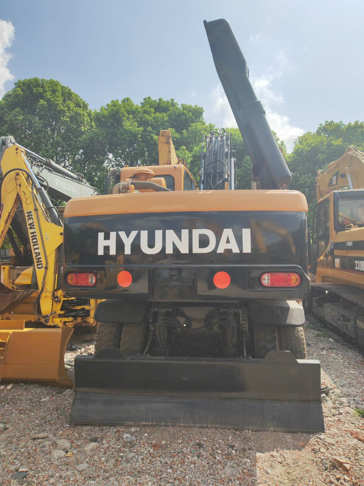 Escavadeira de rodas HYUNDAI R210W-9: foto 7