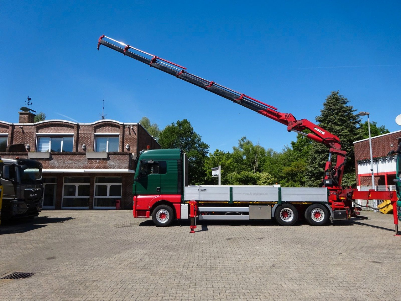 MAN 26.480 TGX + MKG HLK531 Kran +Lift-Lenkachse - Camião grua: foto 1 MAN 26.480 TGX + MKG HLK531 Kran +Lift-Lenkachse - Camião grua: foto 1
