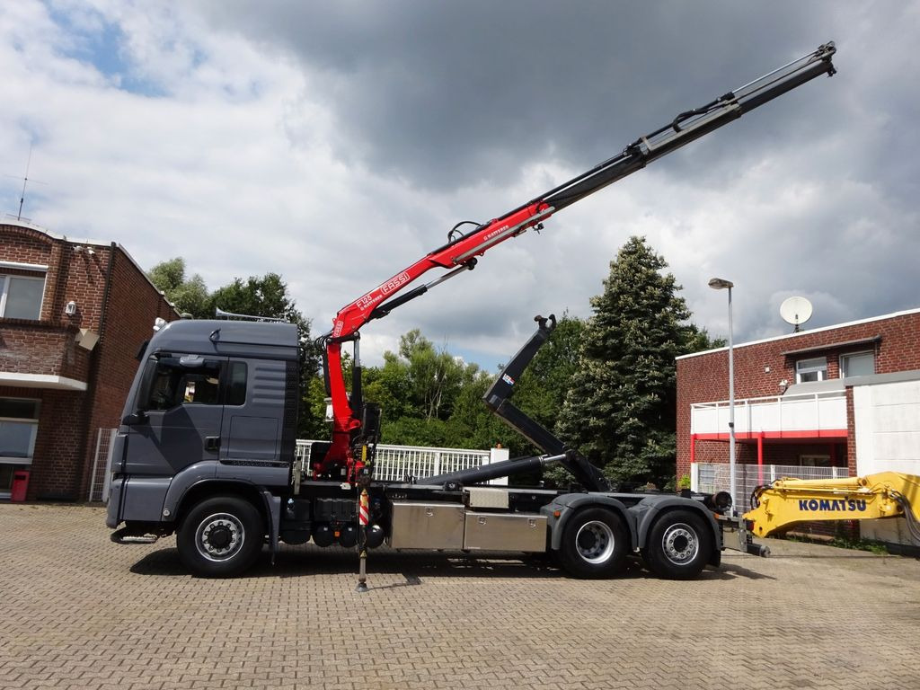 MAN 26.500 Abroller + Fassi F125A Kran 6x2-4 Allrad - Camião polibenne, Camião grua: foto 1 MAN 26.500 Abroller + Fassi F125A Kran 6x2-4 Allrad - Camião polibenne, Camião grua: foto 1