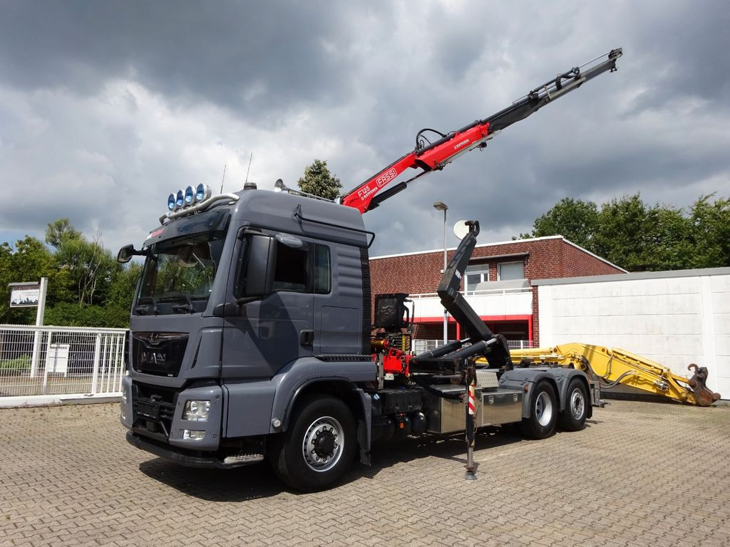 MAN 26.500 Abroller + Fassi F125A Kran 6x2-4 Allrad MAN 26.500 Abroller + Fassi F125A Kran 6x2-4 Allrad - Camião polibenne, Camião grua: foto 2 MAN 26.500 Abroller + Fassi F125A Kran 6x2-4 Allrad MAN 26.500 Abroller + Fassi F125A Kran 6x2-4 Allrad - Camião polibenne, Camião grua: foto 2