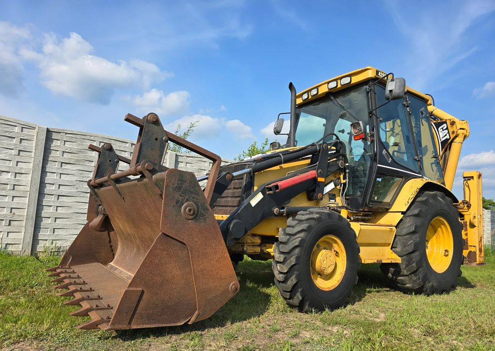 Caterpillar - Retroescavadeira: foto 1 Caterpillar - Retroescavadeira: foto 1