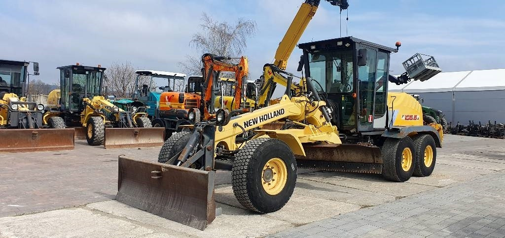 New Holland F 106.6 A - Motoniveladora: foto 1 New Holland F 106.6 A - Motoniveladora: foto 1