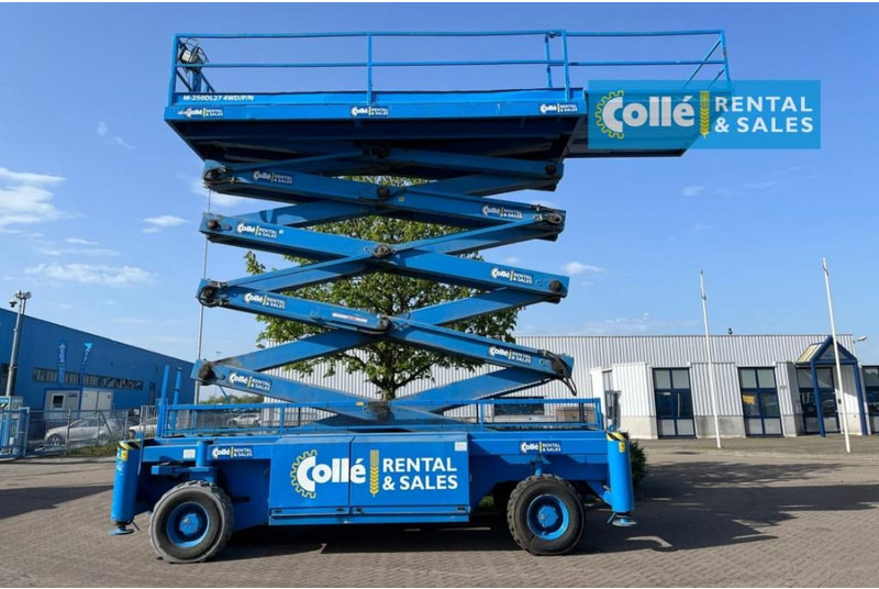 Holland lift M 250 DL 27 | 2003 - Plataforma de Tijera/ Plataforma de tesoura: foto 3 Holland lift M 250 DL 27 | 2003 - Plataforma de Tijera/ Plataforma de tesoura: foto 3