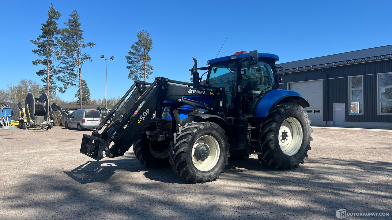New Holland T6070, 2009, Loviisa - Máquina agrícola: foto 1 New Holland T6070, 2009, Loviisa - Máquina agrícola: foto 1