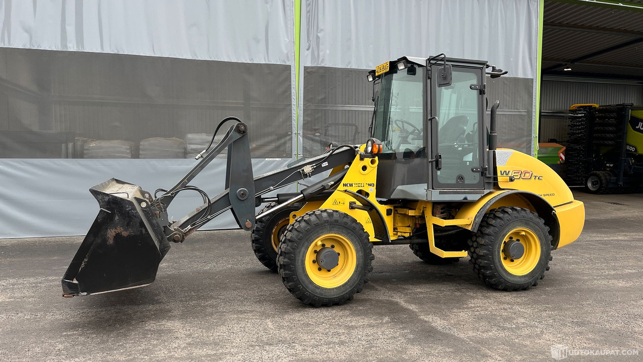 New Holland W80 TC HIGHSP, 2008, pyöräkuormaaja, Seinäjoki - Máquina agrícola: foto 1 New Holland W80 TC HIGHSP, 2008, pyöräkuormaaja, Seinäjoki - Máquina agrícola: foto 1