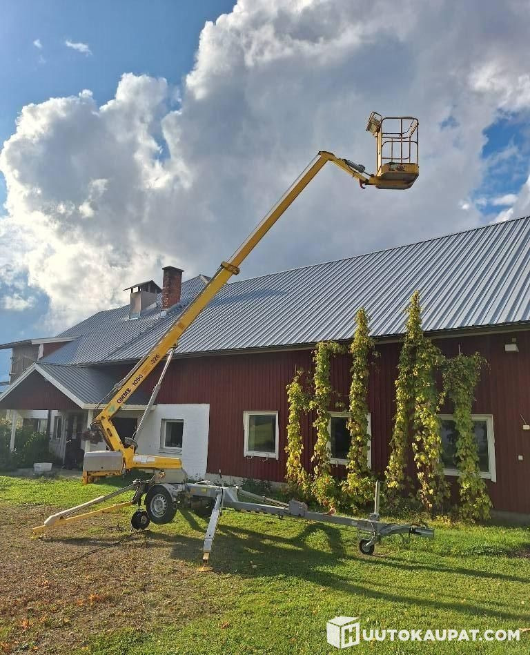 Ommelift 1050EZ, personnel lift, 2009, Pieksämäki - Plataforma de elevaçao rebocável: foto 1 Ommelift 1050EZ, personnel lift, 2009, Pieksämäki - Plataforma de elevaçao rebocável: foto 1