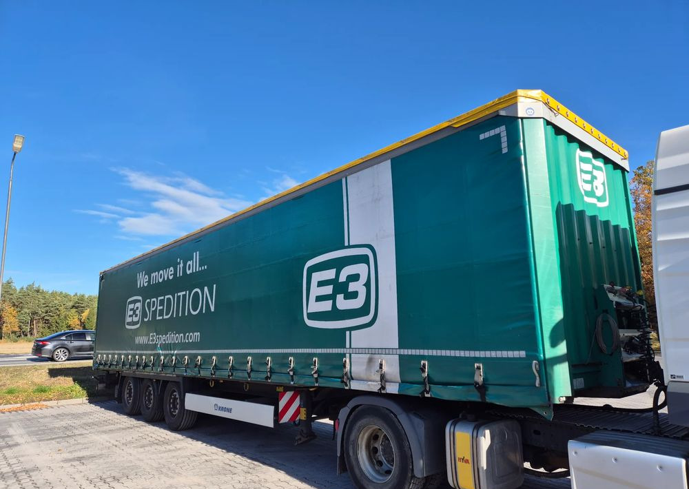 Krone BDE STANDARD PODNOSZONY DACH / z Niemiec PONADGABARYTY POSZERZANA OPONY 80% - Semi-reboque de lona: foto 1 Krone BDE STANDARD PODNOSZONY DACH / z Niemiec PONADGABARYTY POSZERZANA OPONY 80% - Semi-reboque de lona: foto 1