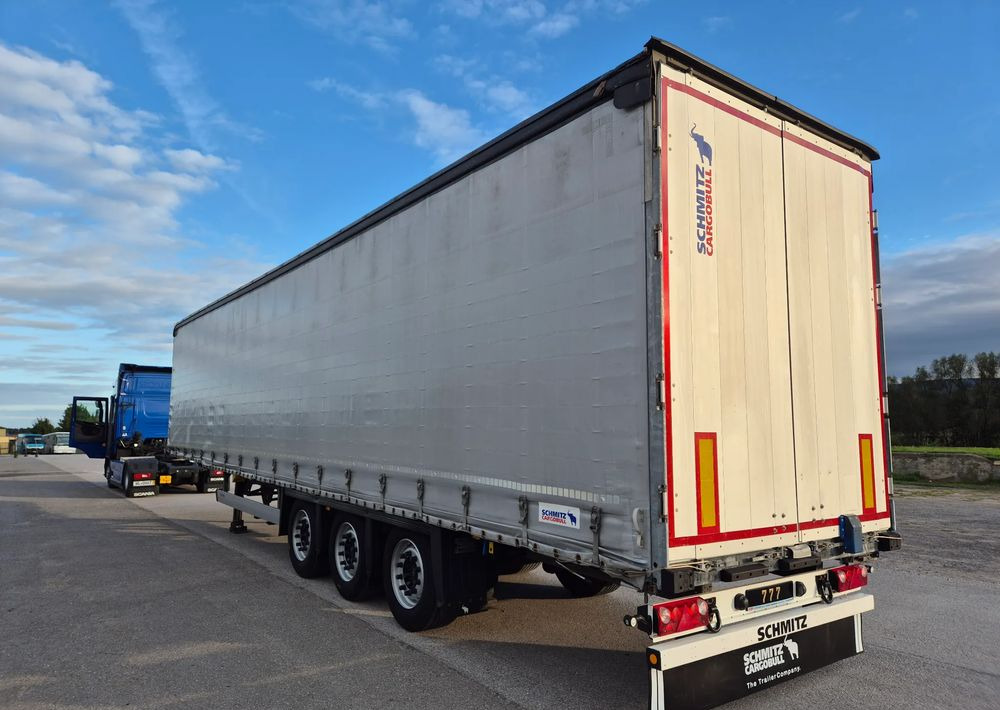 Schmitz Cargobull Varios 2021 podnoszony dach / poziomy jazdy dachu /  od pierwszego właściciela / OKAZJA - Semi-reboque de lona: foto 2 Schmitz Cargobull Varios 2021 podnoszony dach / poziomy jazdy dachu /  od pierwszego właściciela / OKAZJA - Semi-reboque de lona: foto 2