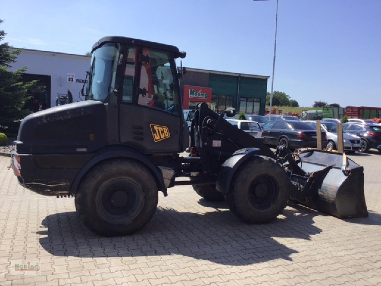 Pá carregadora de rodas JCB 409: foto 6