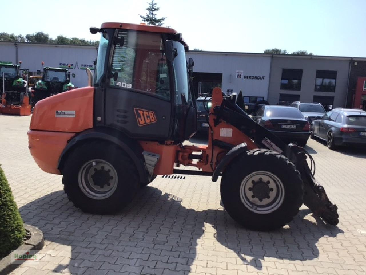 Pá carregadora de rodas JCB 409: foto 7