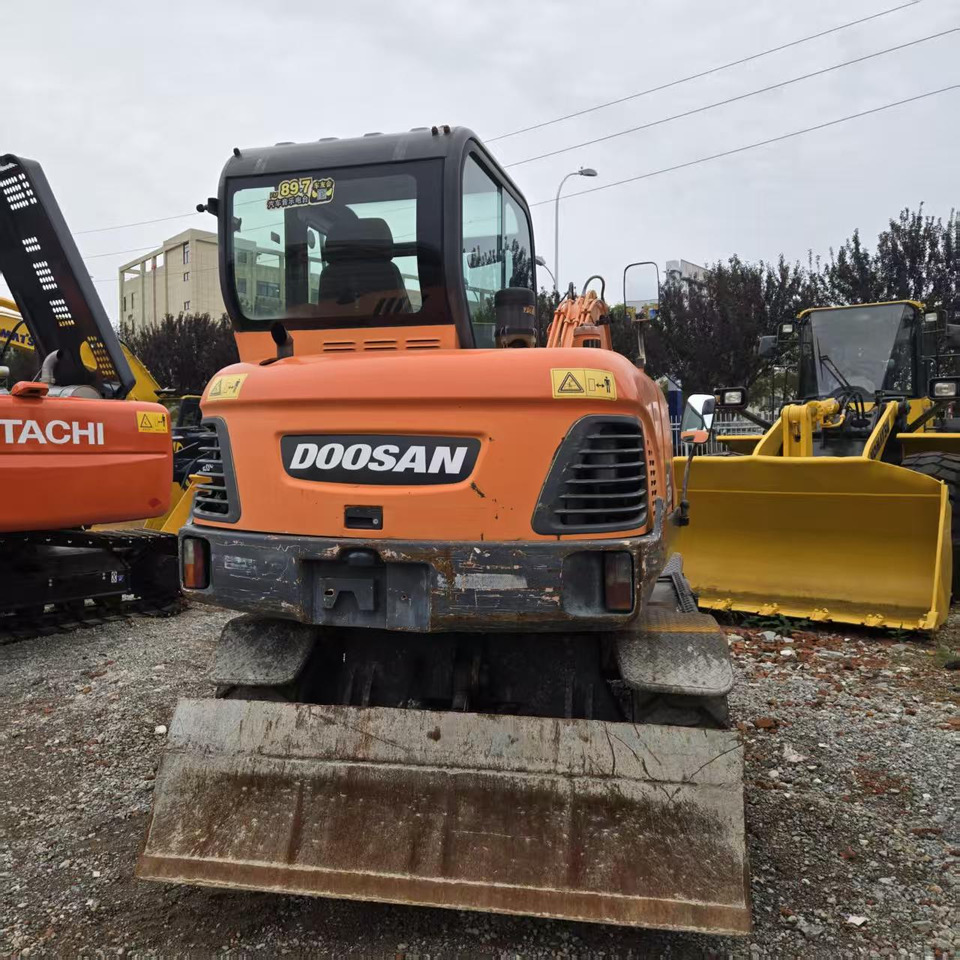 DOOSAN DX60W - Escavadeira de rodas: foto 4 DOOSAN DX60W - Escavadeira de rodas: foto 4