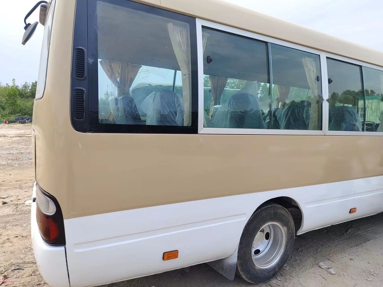 Locação financeira de Toyota Coaster Toyota Coaster: foto 8