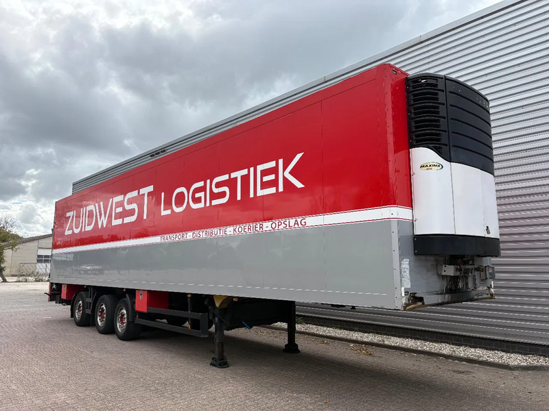 Schmitz Cargobull SKO 24 / SAV ASSEN / DHOLLANDIA 3000 kg / CARRIER MAXIMA 1300 / 1x stuuras / APK - TUV SEPTEMBER 2026 / - Semi-reboque frigorífico: foto 1 Schmitz Cargobull SKO 24 / SAV ASSEN / DHOLLANDIA 3000 kg / CARRIER MAXIMA 1300 / 1x stuuras / APK - TUV SEPTEMBER 2026 / - Semi-reboque frigorífico: foto 1