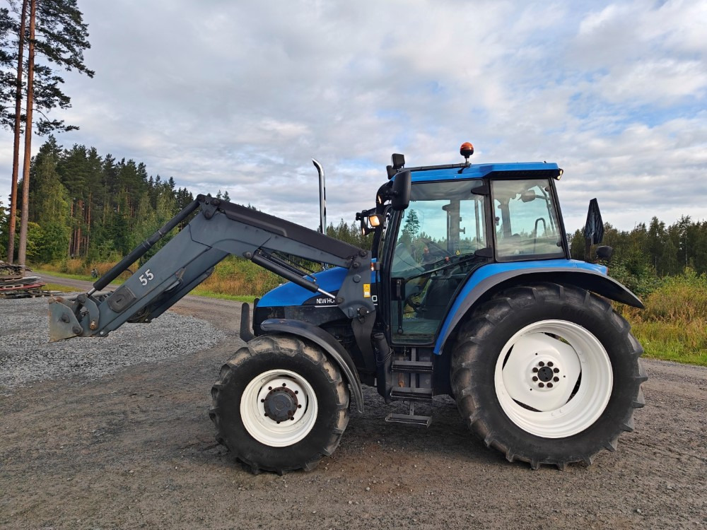 New Holland TS100, ES vaihteisto, ilmastointi, etukuormaaja Ålö Q55, katso video! - Trator: foto 2 New Holland TS100, ES vaihteisto, ilmastointi, etukuormaaja Ålö Q55, katso video! - Trator: foto 2