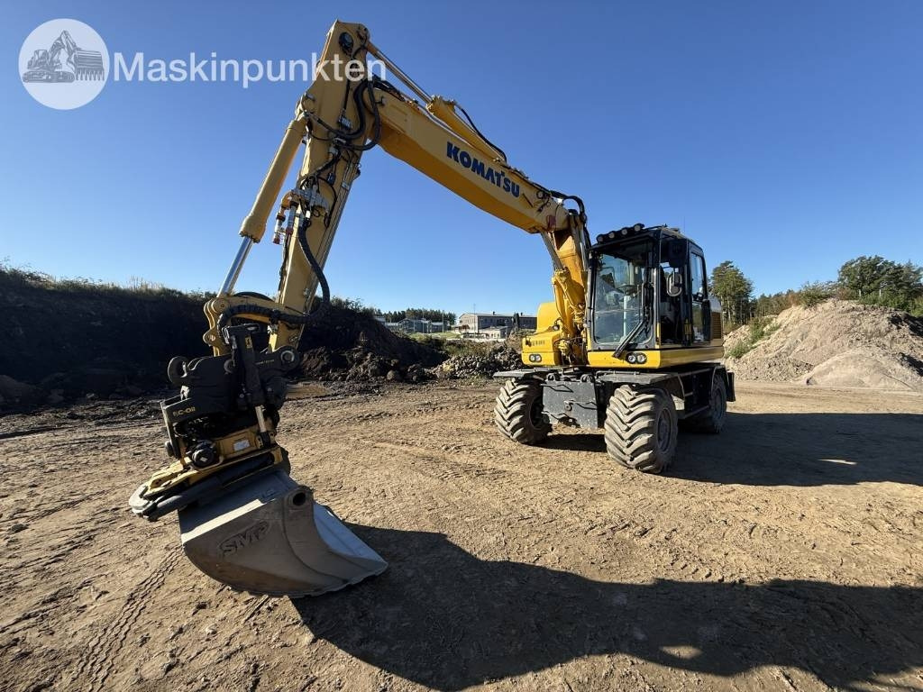 Komatsu PW 160 - Escavadeira de rodas: foto 1 Komatsu PW 160 - Escavadeira de rodas: foto 1