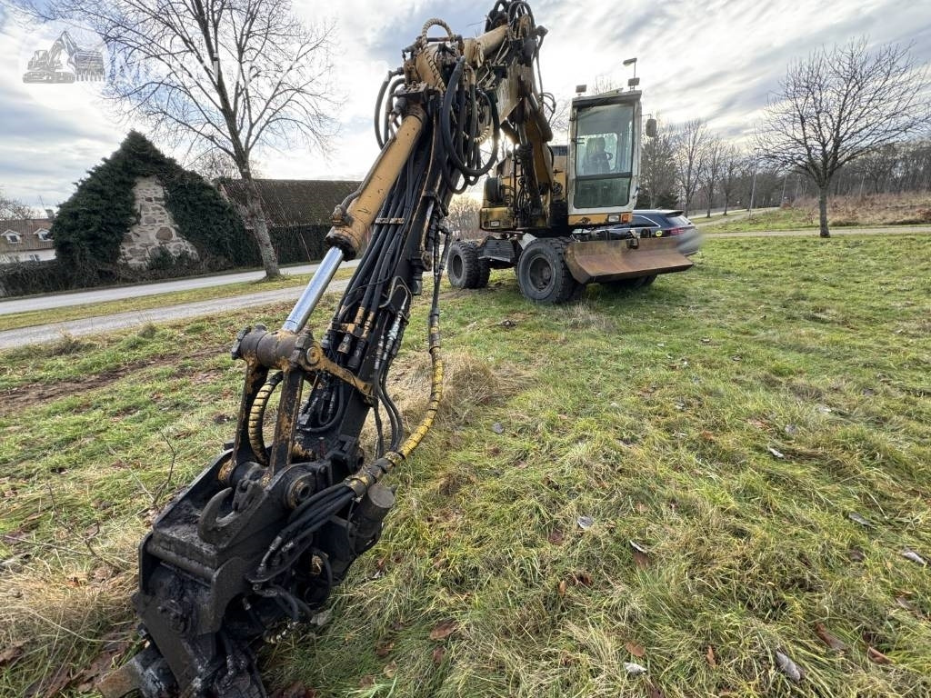 Liebherr A 310 B - Escavadeira de rodas: foto 4 Liebherr A 310 B - Escavadeira de rodas: foto 4