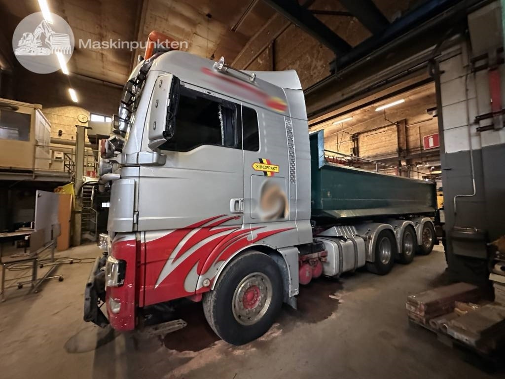 MAN TGX 35.540 - Camião polibenne: foto 1 MAN TGX 35.540 - Camião polibenne: foto 1