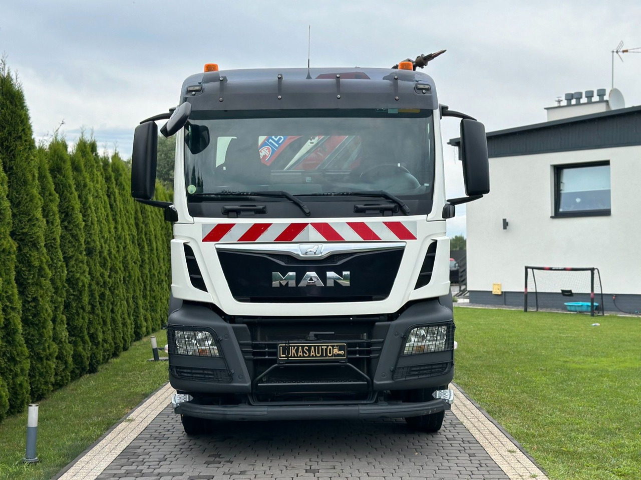 MAN TGS 440 / 8x4 /CRANE HMF 1530/ TIPPER - Camião grua: foto 3 MAN TGS 440 / 8x4 /CRANE HMF 1530/ TIPPER - Camião grua: foto 3