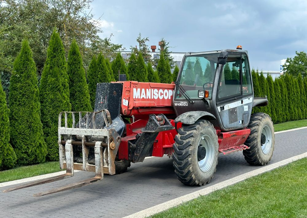 Manitou MT 1233S 12 M - Empilhador telescópico: foto 1 Manitou MT 1233S 12 M - Empilhador telescópico: foto 1