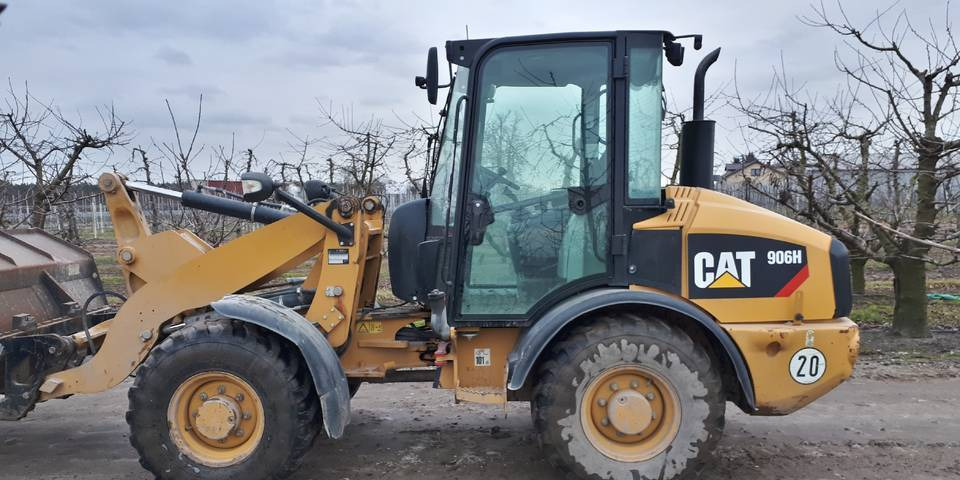 Ładowarka Caterpillar 906H widły + łyżka - Pá carregadora de rodas: foto 1 Ładowarka Caterpillar 906H widły + łyżka - Pá carregadora de rodas: foto 1