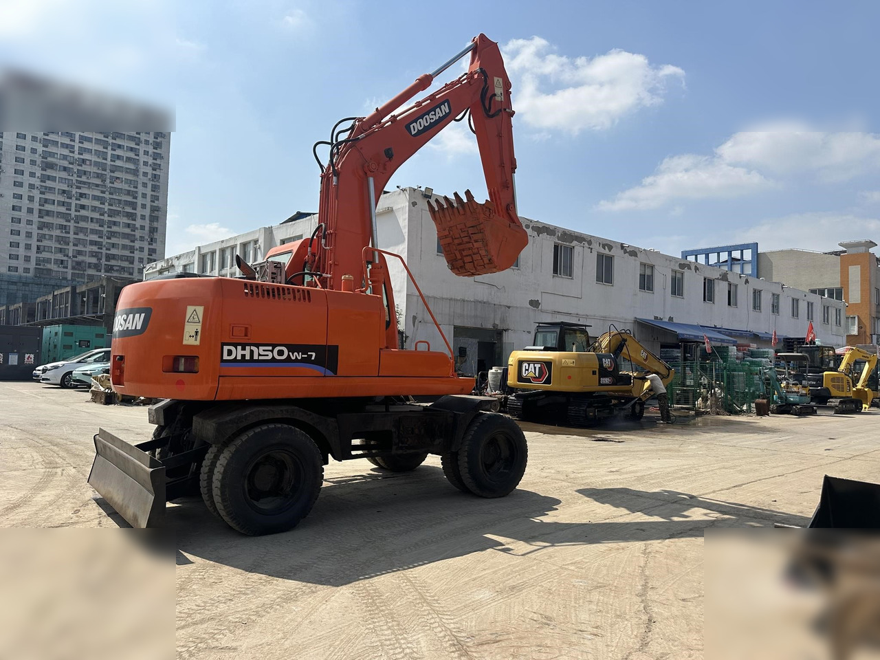 DOOSAN DH150W-7 - Escavadeira de rodas: foto 1 DOOSAN DH150W-7 - Escavadeira de rodas: foto 1