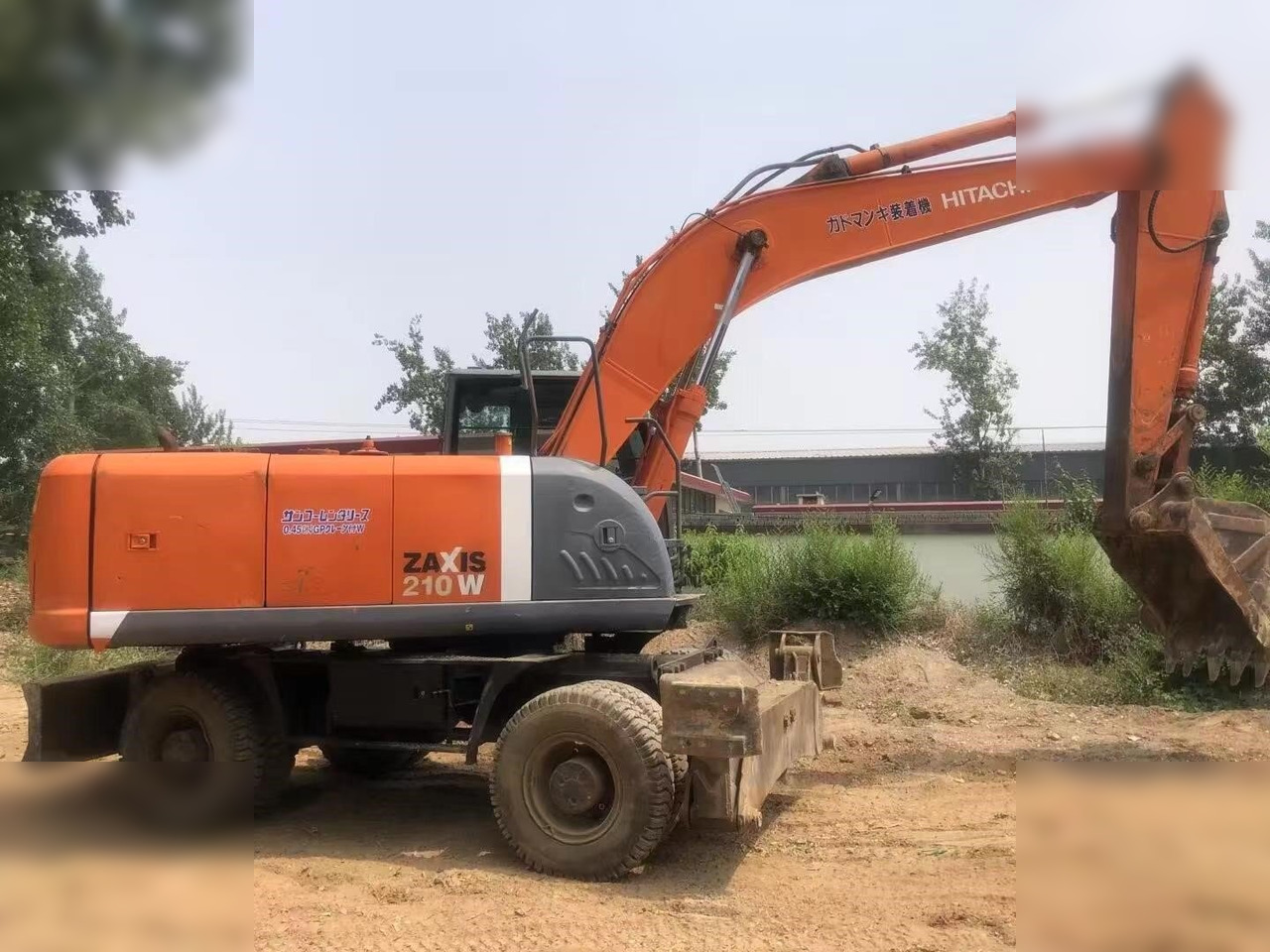 HITACHI ZX210W - Escavadeira de rodas: foto 2 HITACHI ZX210W - Escavadeira de rodas: foto 2