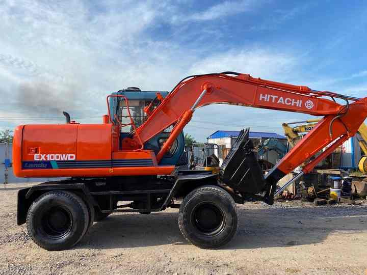 Used Hitachi Ex100WD Wheel Excavator for Sale Japan Made Hitachi Ex100wd Wheeled Excavator for Sale - Escavadeira de rodas: foto 2 Used Hitachi Ex100WD Wheel Excavator for Sale Japan Made Hitachi Ex100wd Wheeled Excavator for Sale - Escavadeira de rodas: foto 2
