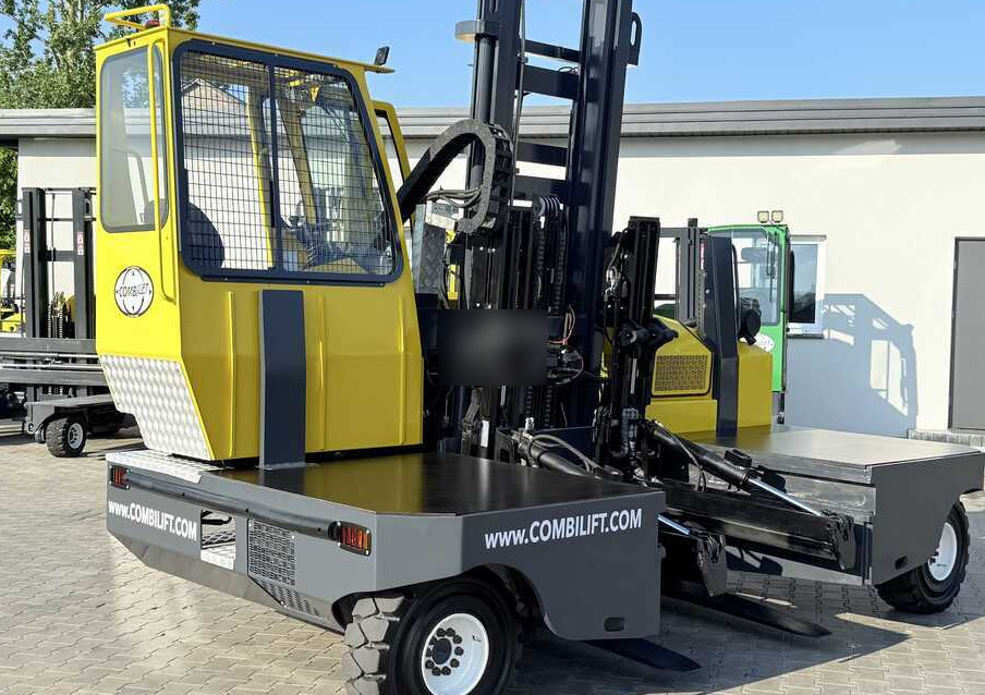 Combilift C6000SR / DUPLEX / 4200MM / LOAD CLAMP ON FORKS / FREE LIFT / DIESEL / POSITIONER / NEW TIRES / LIKE NEW / Wide range of four-way and side loaders, tailored to diverse needs and applications - Empilhador de 4 vias: foto 1 Combilift C6000SR / DUPLEX / 4200MM / LOAD CLAMP ON FORKS / FREE LIFT / DIESEL / POSITIONER / NEW TIRES / LIKE NEW / Wide range of four-way and side loaders, tailored to diverse needs and applications - Empilhador de 4 vias: foto 1