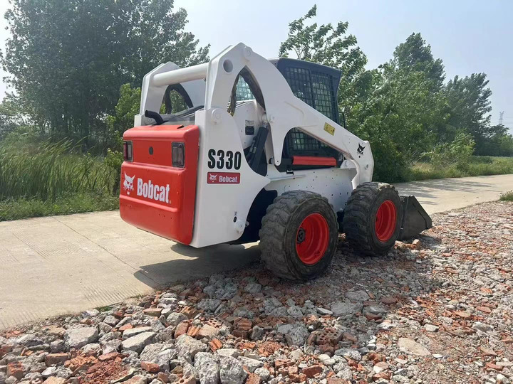 The Best Selling Used Construction Machinery in USA Bobcat S330 Loader High Quality and Cheap Price - Mini pá carregadora: foto 3 The Best Selling Used Construction Machinery in USA Bobcat S330 Loader High Quality and Cheap Price - Mini pá carregadora: foto 3
