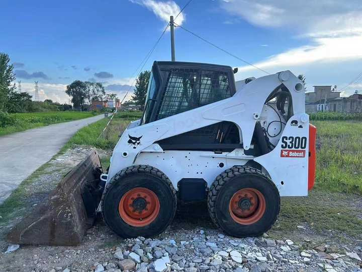 Used Bob Cat Bob Cat S300 Used Mini Skid Steer Wheel Loader Multifunctional Track Loaders Bobcat S300 - Pá carregadora de rodas: foto 4 Used Bob Cat Bob Cat S300 Used Mini Skid Steer Wheel Loader Multifunctional Track Loaders Bobcat S300 - Pá carregadora de rodas: foto 4