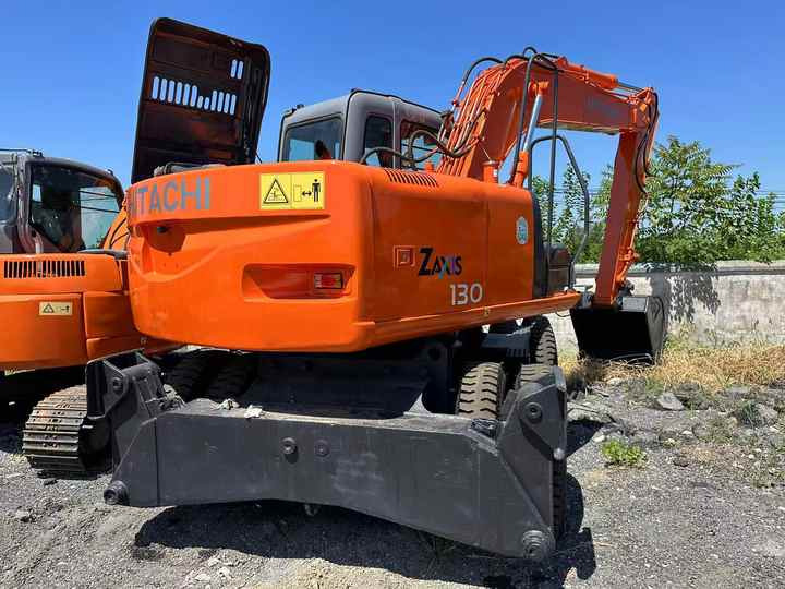 Used Wheel Excavator Hitachi ZX 130W Made in Japan 13ton Hitachi Zx130w Wheel Excavator Price Used Hitachi Zx130 Excavator SALE - Escavadeira de rodas: foto 2 Used Wheel Excavator Hitachi ZX 130W Made in Japan 13ton Hitachi Zx130w Wheel Excavator Price Used Hitachi Zx130 Excavator SALE - Escavadeira de rodas: foto 2