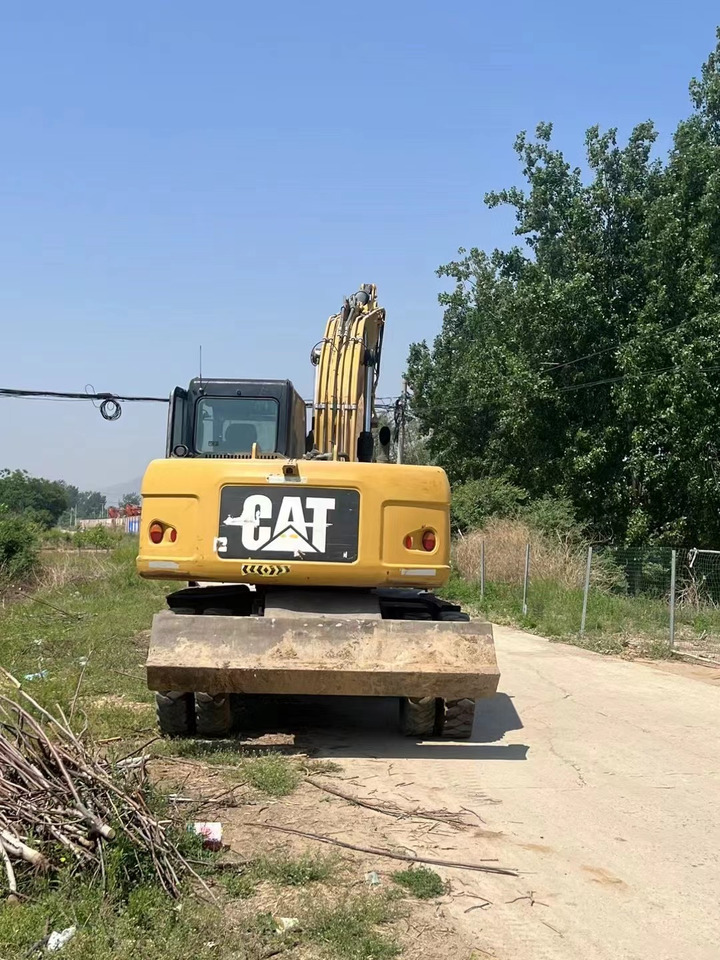 CATERPILLAR M317 - Escavadeira de rodas: foto 3 CATERPILLAR M317 - Escavadeira de rodas: foto 3