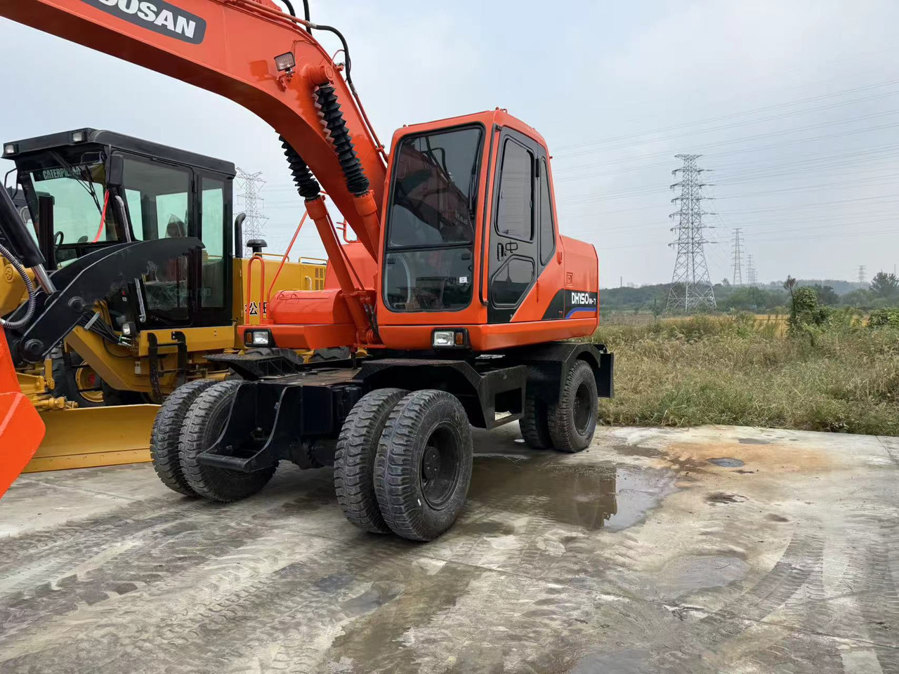 DOOSAN DH150W-7 - Escavadeira de rodas: foto 3 DOOSAN DH150W-7 - Escavadeira de rodas: foto 3