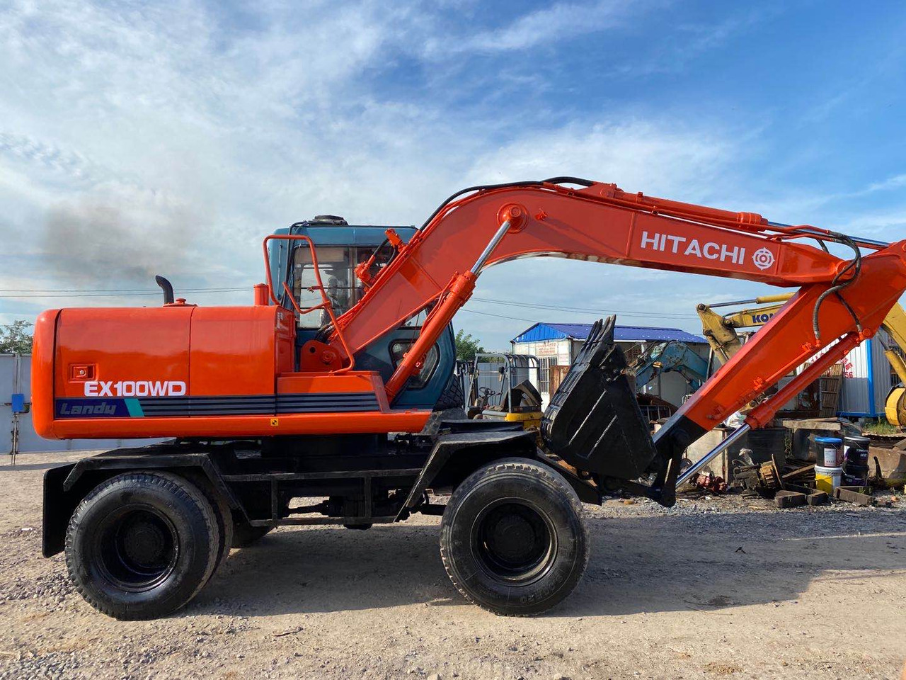 HITACHI EX100WD - Escavadeira de rodas: foto 1 HITACHI EX100WD - Escavadeira de rodas: foto 1