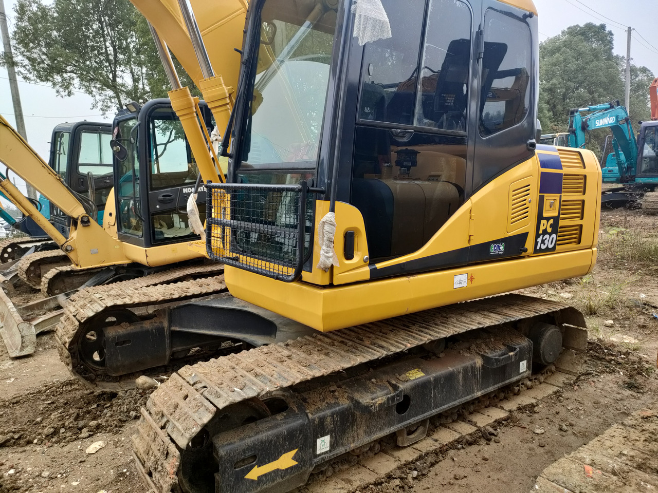 KOMATSU PC130-7 - Escavadeira de rodas: foto 4 KOMATSU PC130-7 - Escavadeira de rodas: foto 4