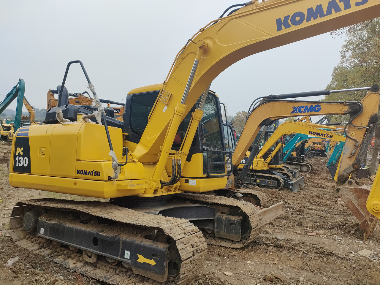 KOMATSU PC130-7 - Escavadeira de rodas: foto 2 KOMATSU PC130-7 - Escavadeira de rodas: foto 2