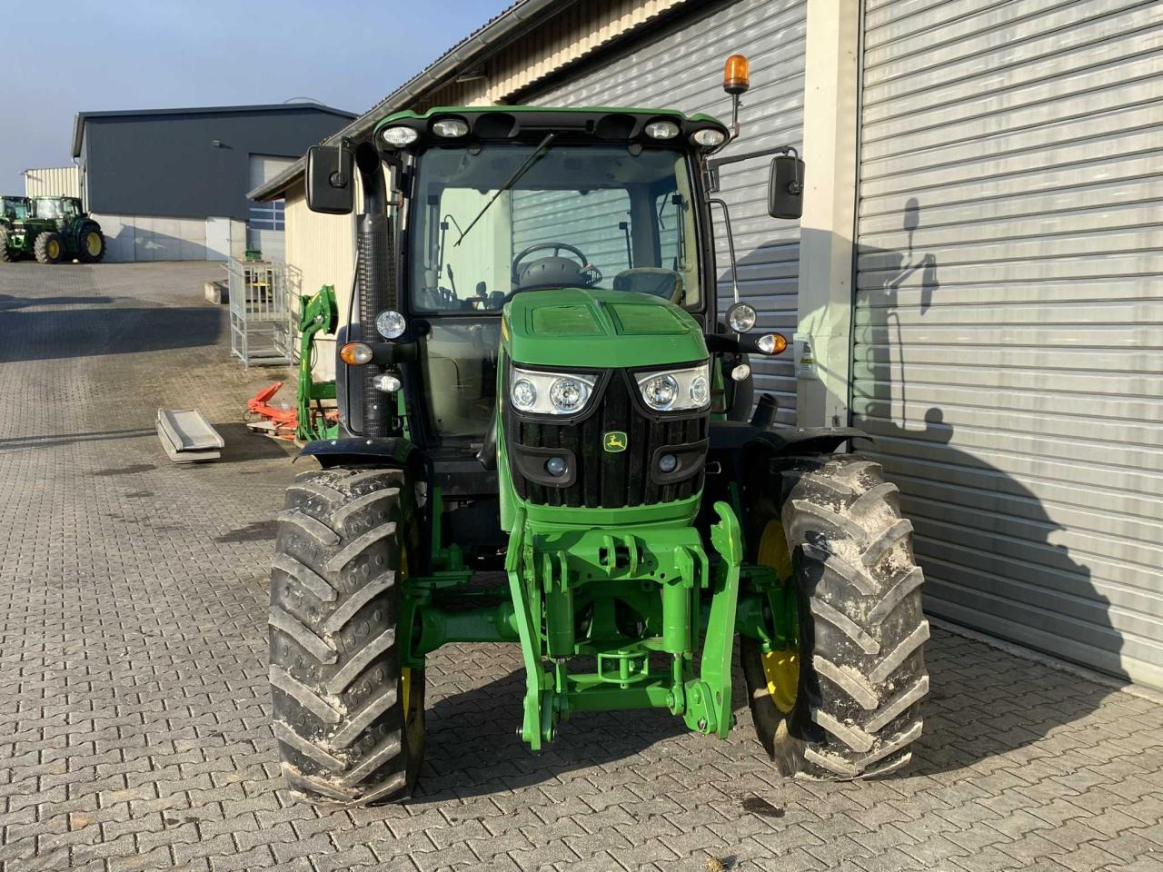 Trator John Deere 6115R: foto 6 Trator John Deere 6115R: foto 6