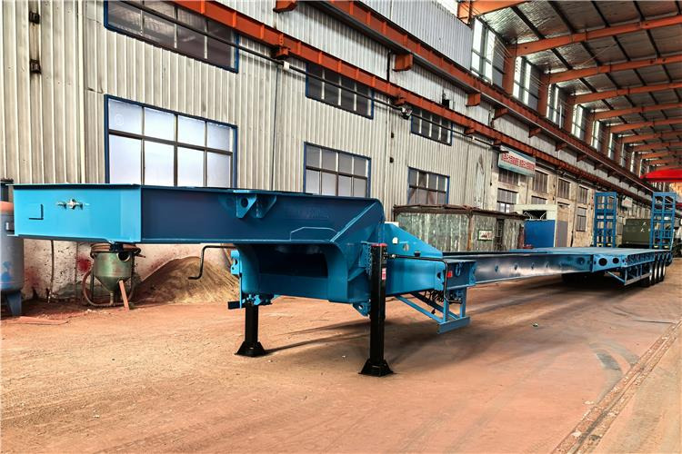TITAN 4 Axle Extendable Low Bed Trailer for Sale In Nigeria - Semi-reboque baixa: foto 1 TITAN 4 Axle Extendable Low Bed Trailer for Sale In Nigeria - Semi-reboque baixa: foto 1