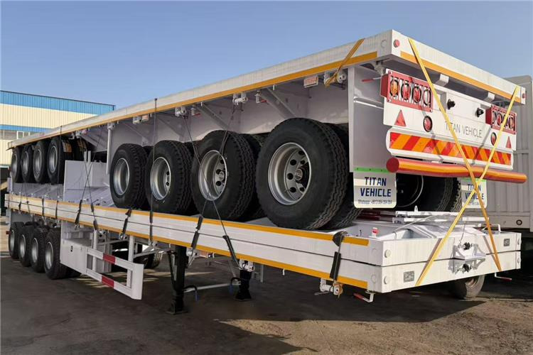 TITAN 4 Axle Flatbed Trailer for Sale In Saudi Arabia - Semi-reboque plataforma/ Caixa aberta: foto 5 TITAN 4 Axle Flatbed Trailer for Sale In Saudi Arabia - Semi-reboque plataforma/ Caixa aberta: foto 5