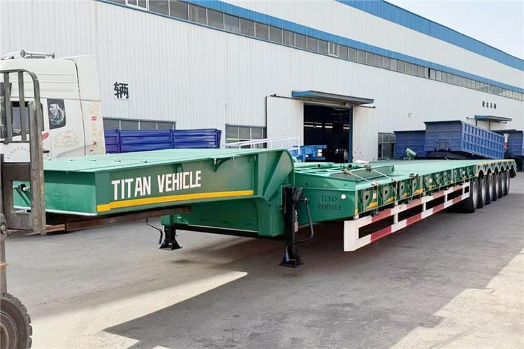 TITAN 6 Axle 80 Ton Low Loader Semi Trailer for Sale In Zambia - Semi-reboque baixa: foto 1 TITAN 6 Axle 80 Ton Low Loader Semi Trailer for Sale In Zambia - Semi-reboque baixa: foto 1