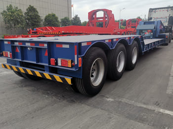 TITAN 80 Ton Lowboy Semi Trailer for Sale in Tanzania - Semi-reboque baixa: foto 1 TITAN 80 Ton Lowboy Semi Trailer for Sale in Tanzania - Semi-reboque baixa: foto 1