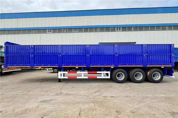 TITAN 80 Ton Side Wall Trailer for Sale Price In United Arab Emirates - Semi-reboque plataforma/ Caixa aberta: foto 4 TITAN 80 Ton Side Wall Trailer for Sale Price In United Arab Emirates - Semi-reboque plataforma/ Caixa aberta: foto 4