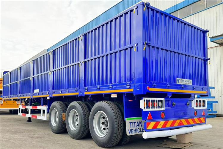 TITAN 80 Ton Side Wall Trailer for Sale Price In United Arab Emirates - Semi-reboque plataforma/ Caixa aberta: foto 2 TITAN 80 Ton Side Wall Trailer for Sale Price In United Arab Emirates - Semi-reboque plataforma/ Caixa aberta: foto 2